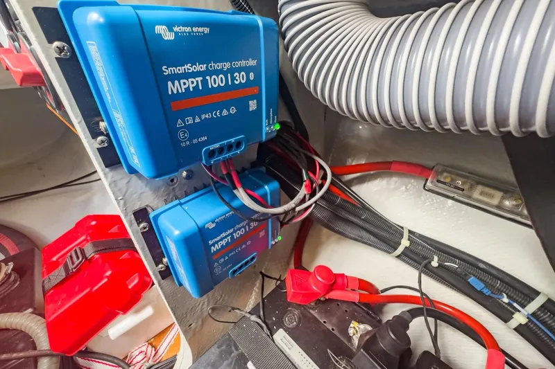 Sweet Sweet Life Yacht Photos Pics Victron Energy SmartSolar charge controllers in Lagoon 42, 2020 model, with wiring and components.