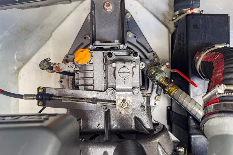 Sweet Sweet Life Yacht Photos Pics Engine compartment of a 2020 Lagoon 42 catamaran, featuring mechanical components and hoses.