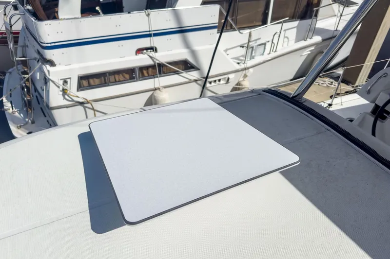 Sweet Sweet Life Yacht Photos Pics Rooftop of 2020 Lagoon 42 catamaran with a mounted satellite dish.