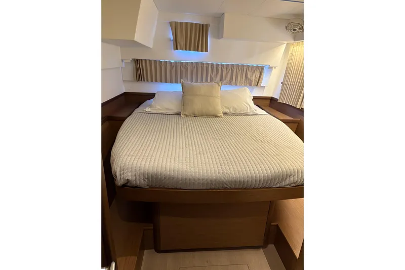 Sweet Sweet Life Yacht Photos Pics Cozy bedroom interior of 2020 Lagoon 42 yacht with comfortable bedding.