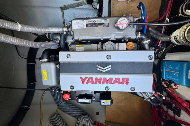 Owners Version Yacht Photos Pics Yanmar engine in a 2020 Lagoon 42 catamaran, showcasing detailed mechanical components.