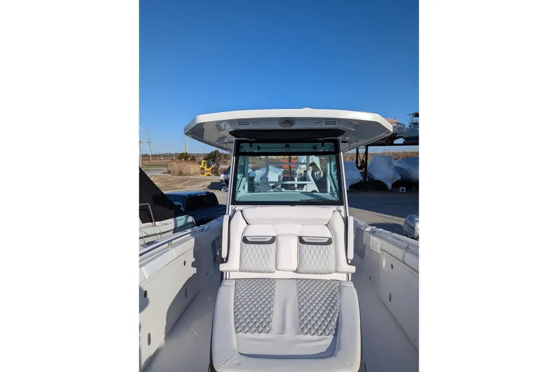  Yacht Photos Pics 2024 Blackfin 332 CC boat with sleek design and luxurious seating.