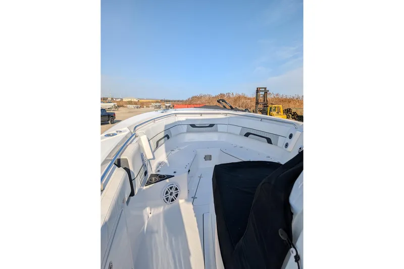  Yacht Photos Pics 2024 Blackfin 332 CC boat interior with white seating and modern design.