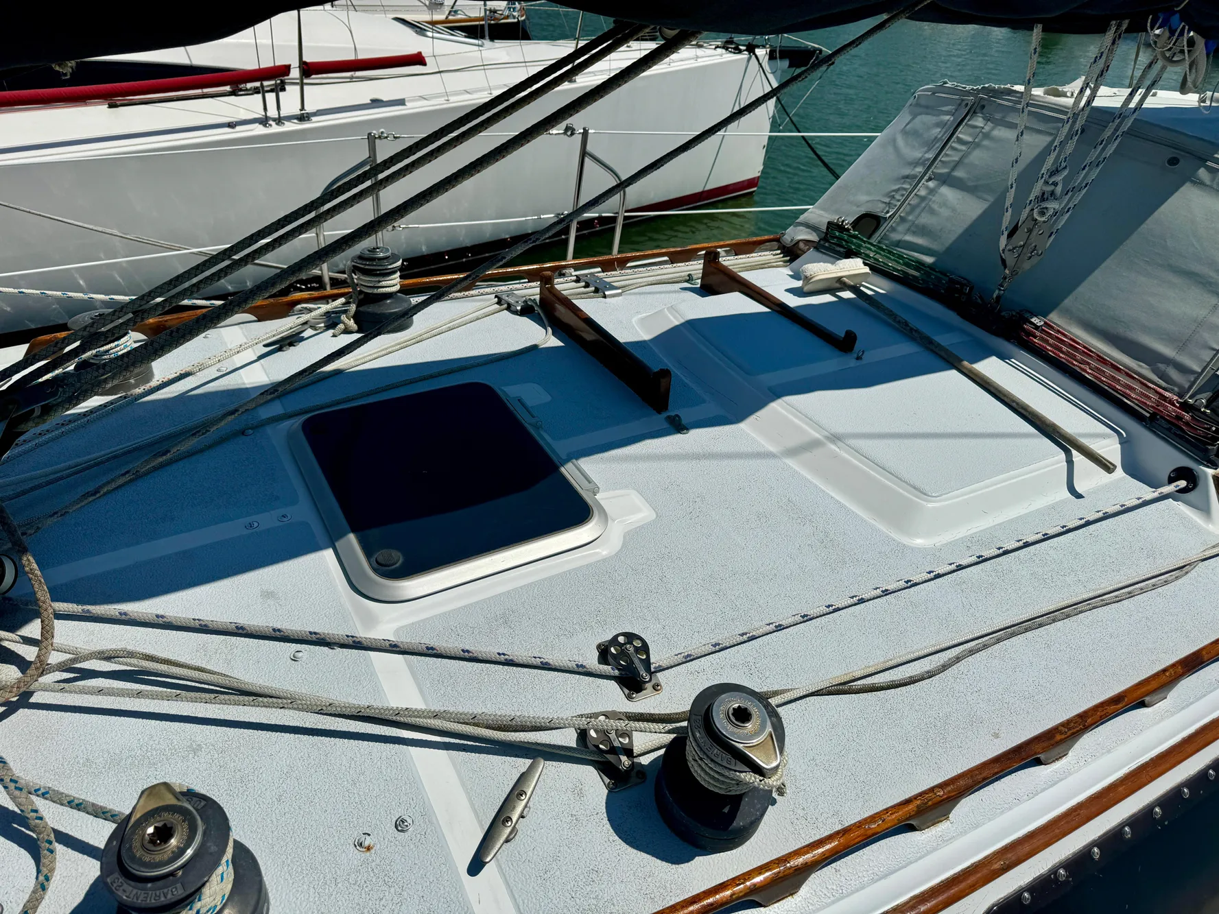 Deck of 1979 Islander IP Peterson 40 sailboat with winches and rigging.
