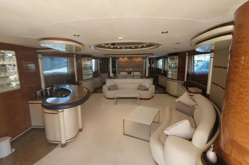  Yacht Photos Pics Luxurious interior of 2002 Horizon 105 yacht with elegant seating and modern design.