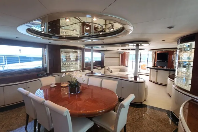  Yacht Photos Pics Luxurious interior of 2002 Horizon 105 yacht with elegant dining and lounge area.