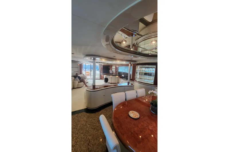  Yacht Photos Pics Luxurious interior of 2002 Horizon 105 yacht with elegant dining and lounge areas.