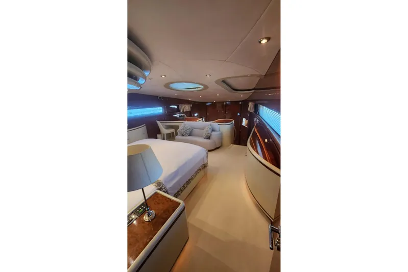  Yacht Photos Pics Luxurious interior of 2002 Horizon 105 yacht with elegant furnishings and ambient lighting.