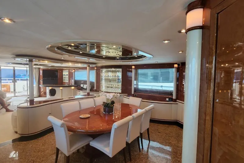  Yacht Photos Pics Luxurious interior of 2002 Horizon 105 yacht with elegant dining area and modern decor.