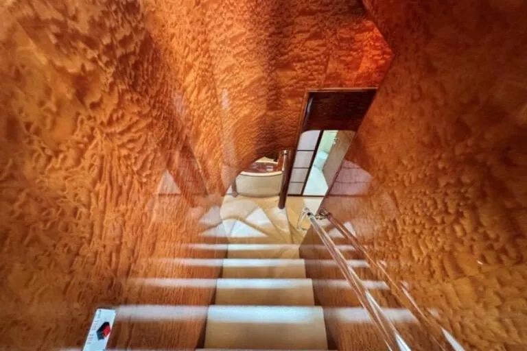  Yacht Photos Pics Luxurious wooden staircase interior on Horizon 105 yacht, 2002 model.