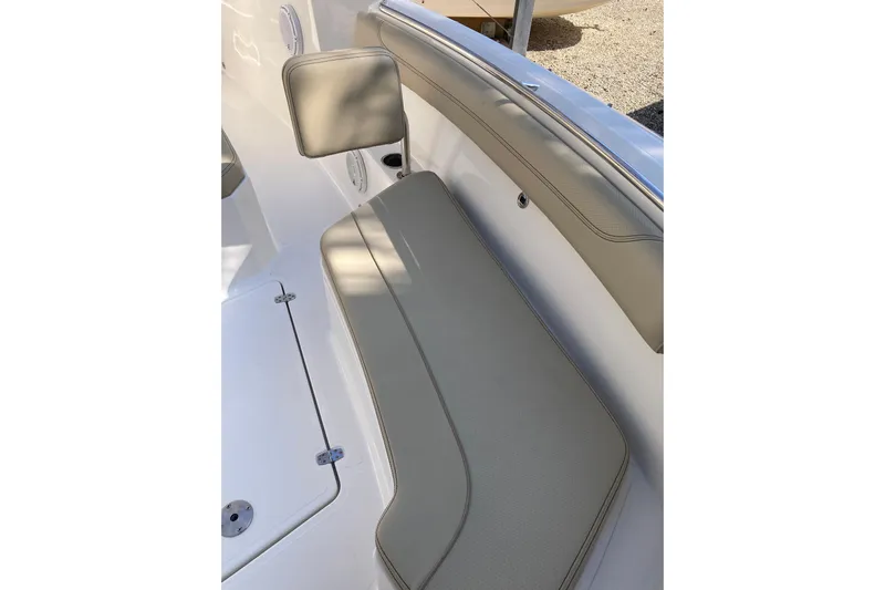 No Jet Lag Yacht Photos Pics 2019 Pursuit S 288 Sport boat interior seating with beige upholstery.