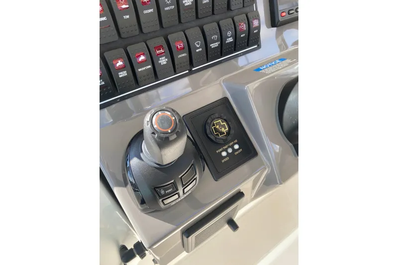 No Jet Lag Yacht Photos Pics 2019 Pursuit S 288 Sport boat control panel with joystick and switches.