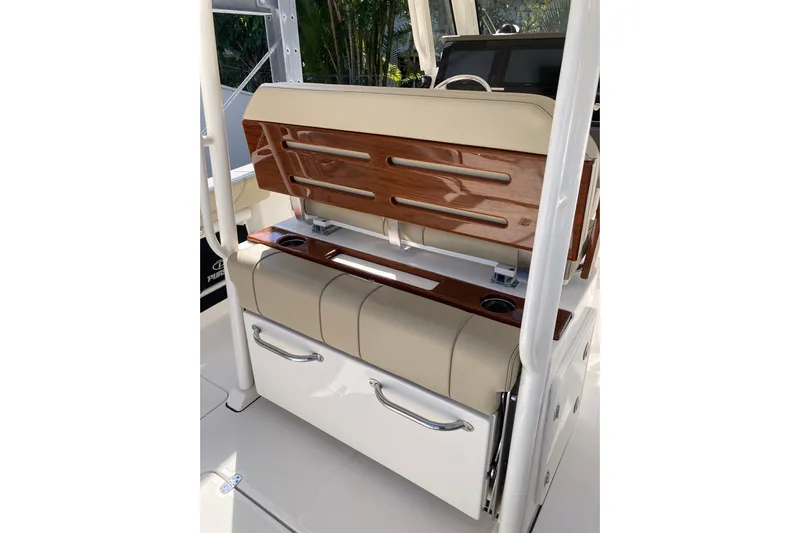 No Jet Lag Yacht Photos Pics 2019 Pursuit S 288 Sport boat interior with cushioned seating and storage drawers.