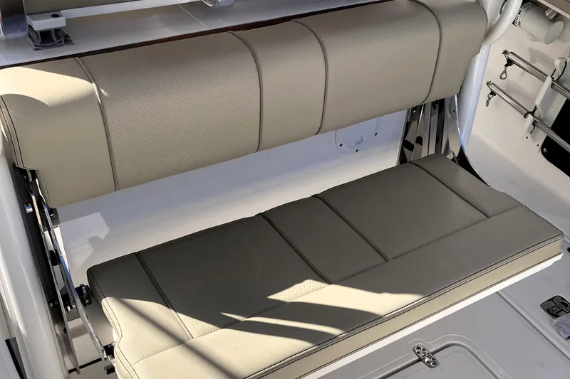 No Jet Lag Yacht Photos Pics 2019 Pursuit S 288 Sport boat seating with beige upholstery and foldable design.