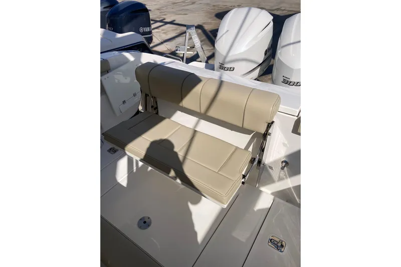No Jet Lag Yacht Photos Pics 2019 Pursuit S 288 Sport boat with beige seating and Yamaha engines.