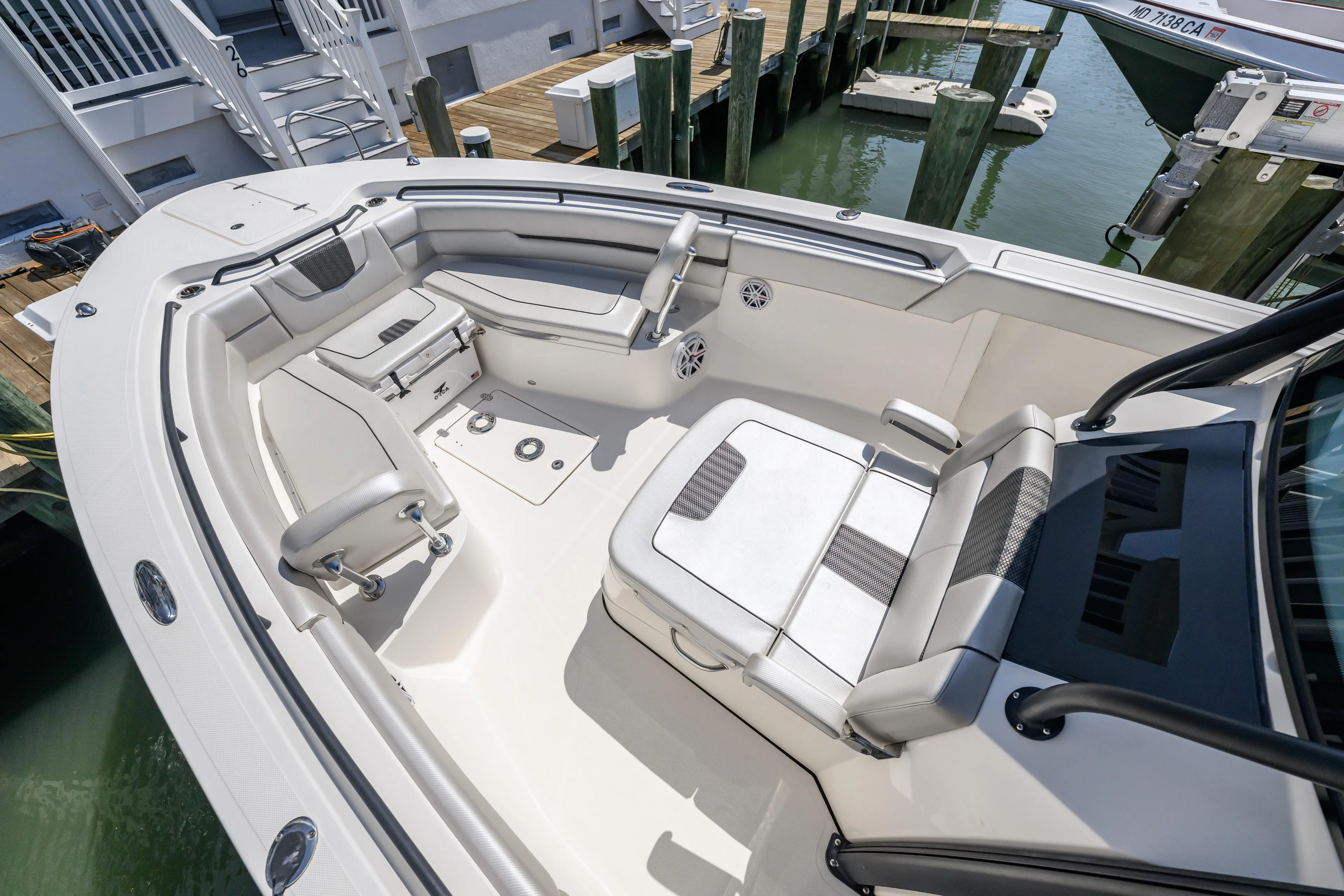 Jokers Jewel Yacht Photos Pics 2019 Wellcraft 352 Fisherman boat interior with cushioned seating and storage compartments.