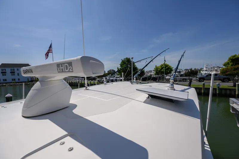Jokers Jewel Yacht Photos Pics 2019 Wellcraft 352 Fisherman boat with Garmin xHD2 radar, docked in a marina.