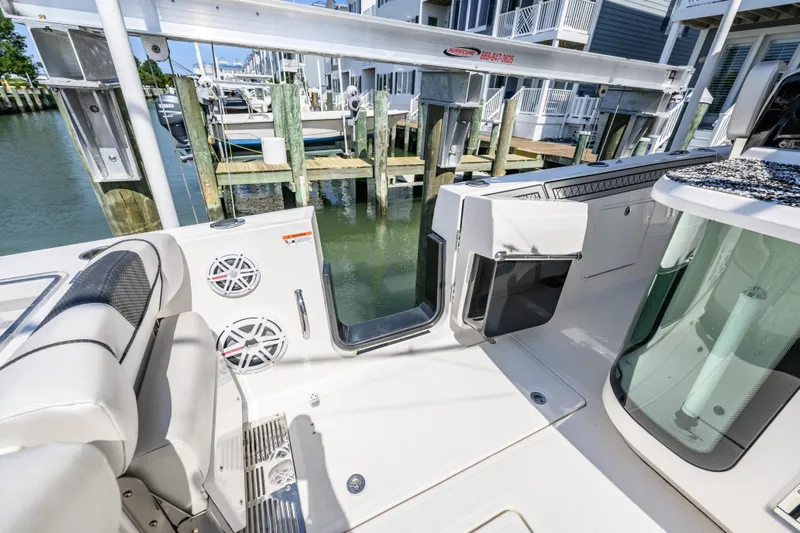 Jokers Jewel Yacht Photos Pics 2019 Wellcraft 352 Fisherman boat interior with open door, docked at marina.