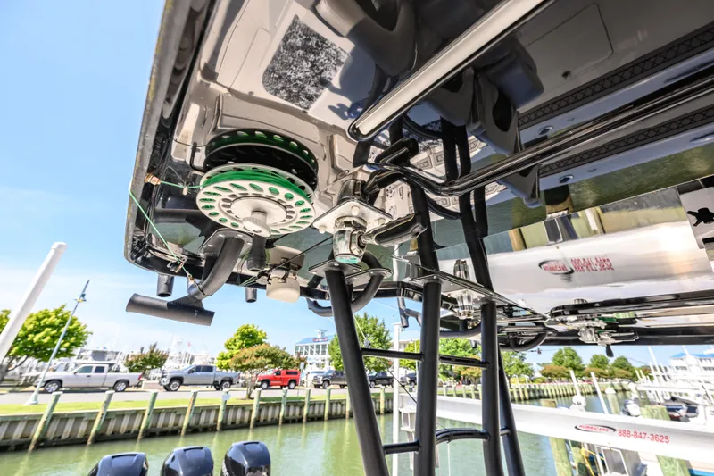 Jokers Jewel Yacht Photos Pics 2019 Wellcraft 352 Fisherman boat with detailed view of fishing equipment and docked marina.