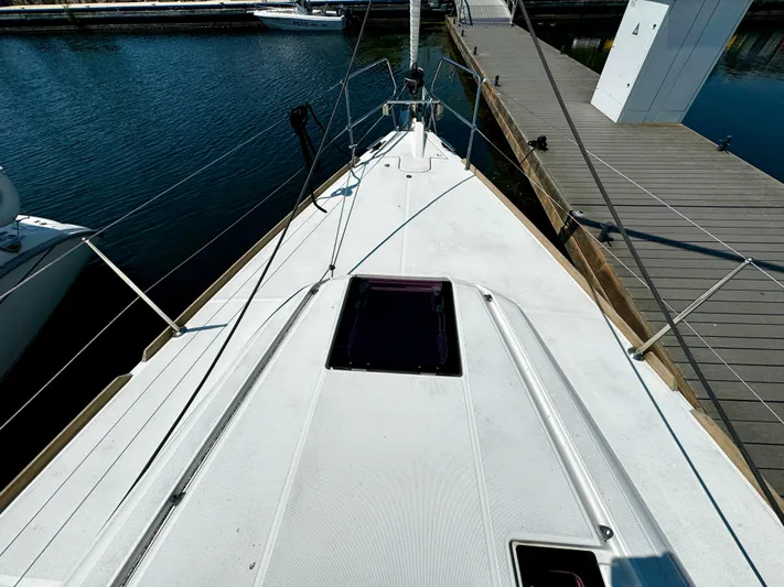  Yacht Photos Pics Jeanneau Sun Odyssey 409 sailboat deck, docked at marina, 2011 model.