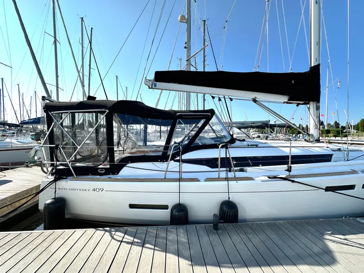  Yacht Photos Pics Jeanneau Sun Odyssey 409 sailboat docked at marina, 2011 model.