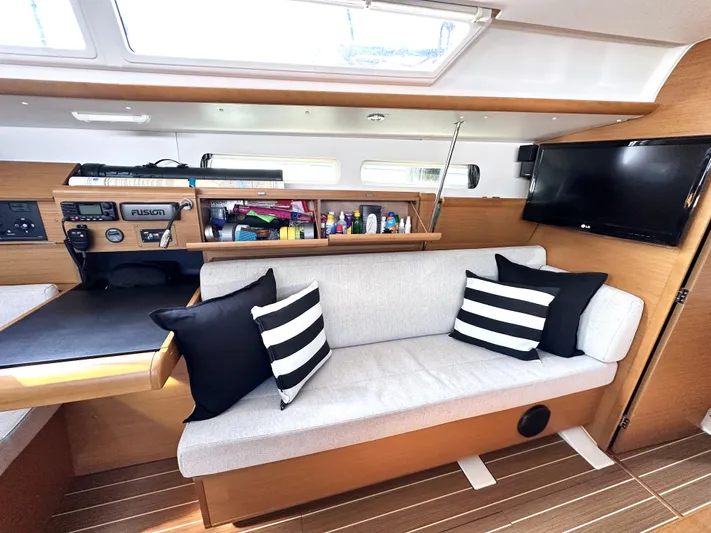  Yacht Photos Pics Interior of 2011 Jeanneau Sun Odyssey 409 yacht with cozy seating and modern amenities.