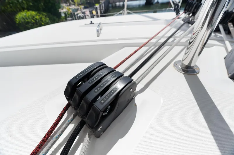 Curvy Mermaid Yacht Photos Pics Close-up of rope clutches on a 2017 Lagoon 42 catamaran deck.