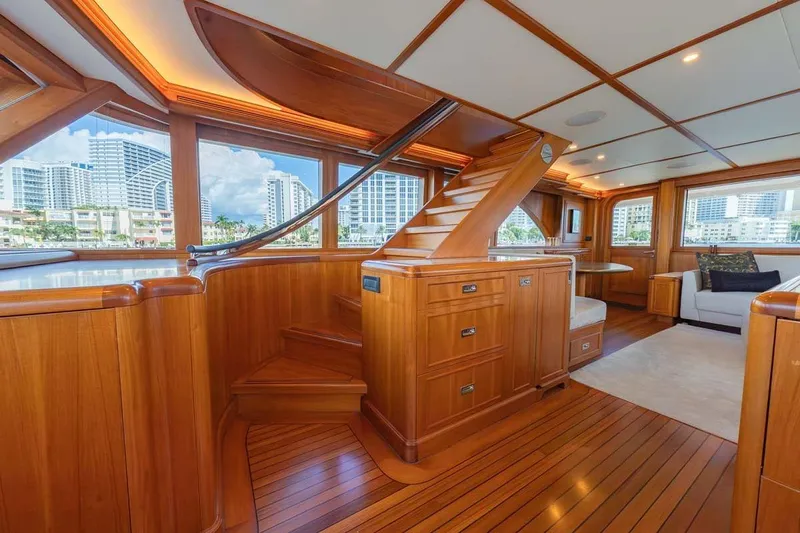 Catch Yacht Photos Pics Luxurious 1984 Feadship Yacht Fish interior with elegant wood finish and modern furnishings.