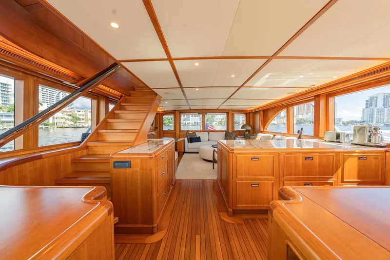 Catch Yacht Photos Pics Luxurious interior of 1984 Feadship Yacht Fish with elegant wood finishes and spacious layout.