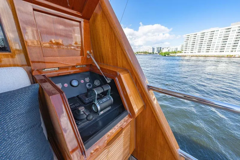 Catch Yacht Photos Pics Control panel of 1984 Feadship Yacht Fish with waterfront view.