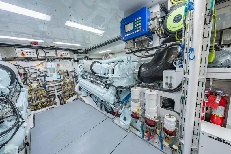 Catch Yacht Photos Pics Engine room of 1984 Feadship Yacht Fish, showcasing machinery and control systems.