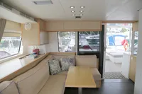 Interior of 2013 Lagoon 52 F yacht with cozy seating and modern design.