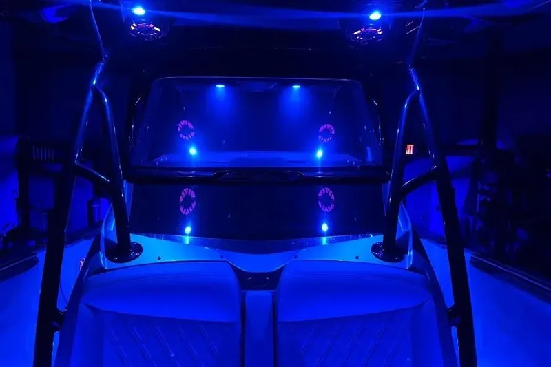  Yacht Photos Pics 2021 Nor-Tech 390 Sport Center Console with blue LED lighting at night.