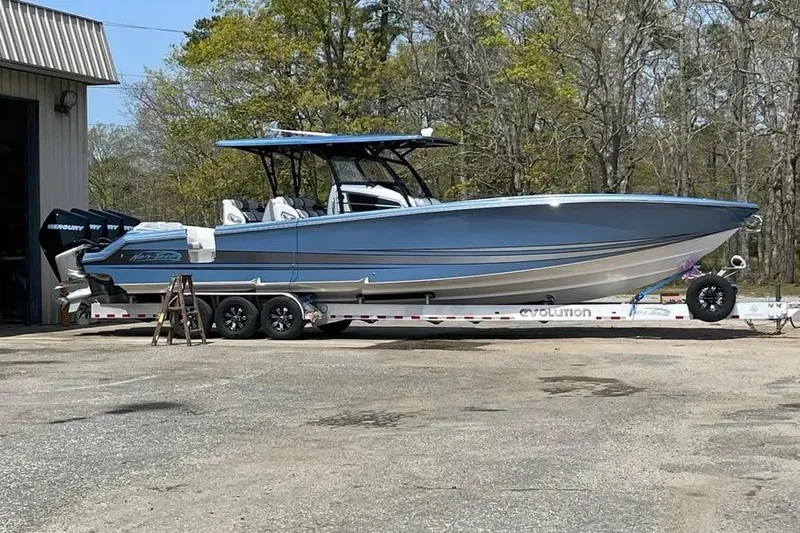 Yacht Photos Pics 2021 Nor-Tech 390 Sport Center Console boat on trailer, parked outdoors.