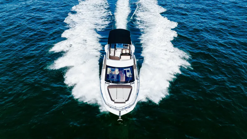 Lei Vola Yacht Photos Pics 2022 Galeon 400 Fly yacht cruising on open water, aerial view.