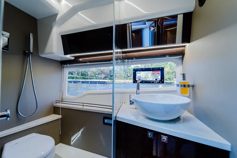 Lei Vola Yacht Photos Pics Luxurious bathroom interior of 2022 Galeon 400 Fly yacht with modern fixtures.