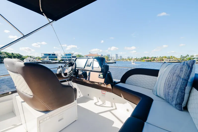 Lei Vola Yacht Photos Pics Luxurious 2022 Galeon 400 Fly yacht interior with city skyline view.