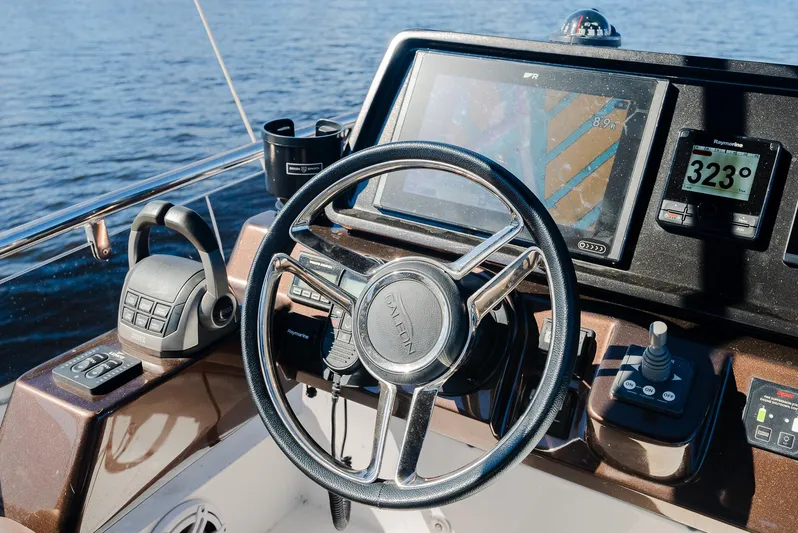 Lei Vola Yacht Photos Pics Galeon 400 Fly 2022 yacht helm with navigation controls and display.
