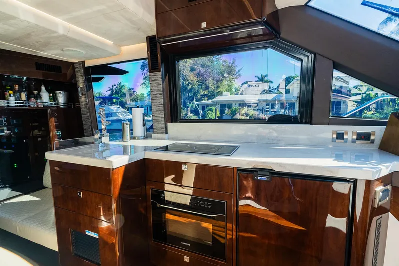 Lei Vola Yacht Photos Pics Luxurious kitchen interior of 2022 Galeon 400 Fly yacht with modern amenities.