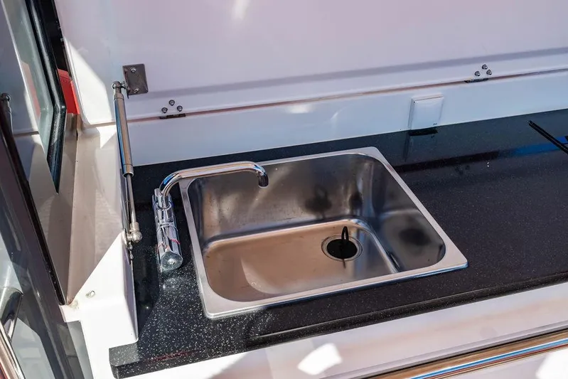  Yacht Photos Pics Stainless steel sink in 2023 Nimbus Tender 11 boat kitchen area.