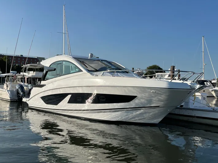  Yacht Photos Pics 2024 Beneteau Gran Turismo 32 Inboard yacht docked in a marina.