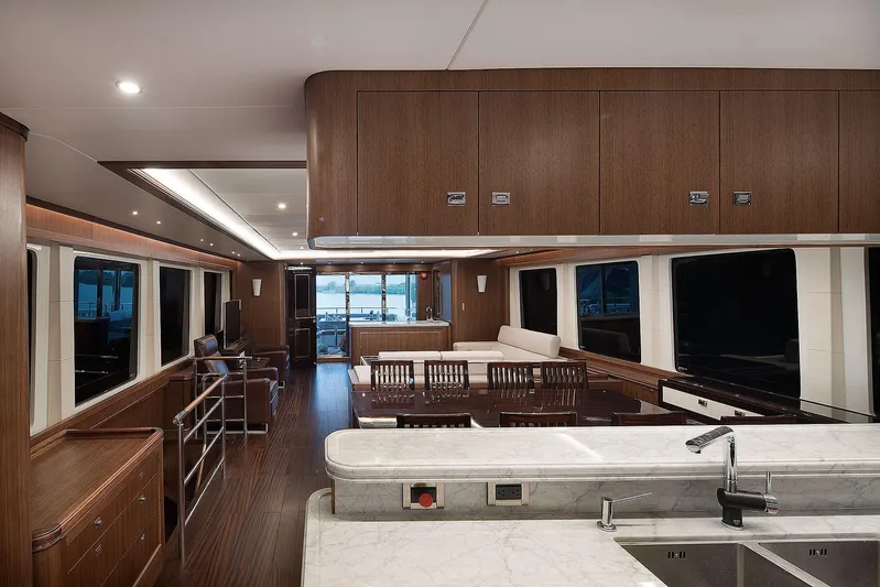  Yacht Photos Pics Luxurious interior of 2026 Selene 92 Explorer yacht with modern wood finishes and spacious seating.