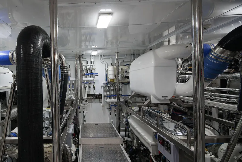  Yacht Photos Pics Engine room of 2026 Selene 92 Explorer yacht, featuring advanced mechanical systems and piping.