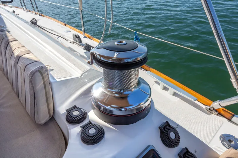 Shenanigans Yacht Photos Pics Jeanneau 53DS 2015 sailboat deck with winch and ocean view.