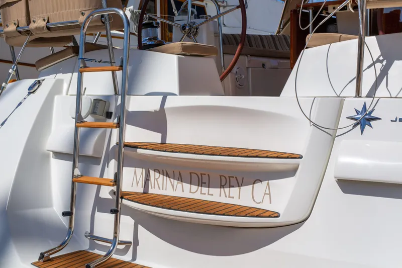 Shenanigans Yacht Photos Pics Jeanneau 53DS 2015 yacht at Marina del Rey, CA with wooden steps and ladder.