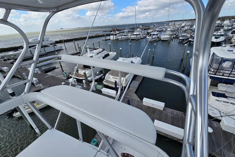  Yacht Photos Pics View from Ocean Yachts 55 Super Sport 1982, overlooking marina with multiple boats docked.