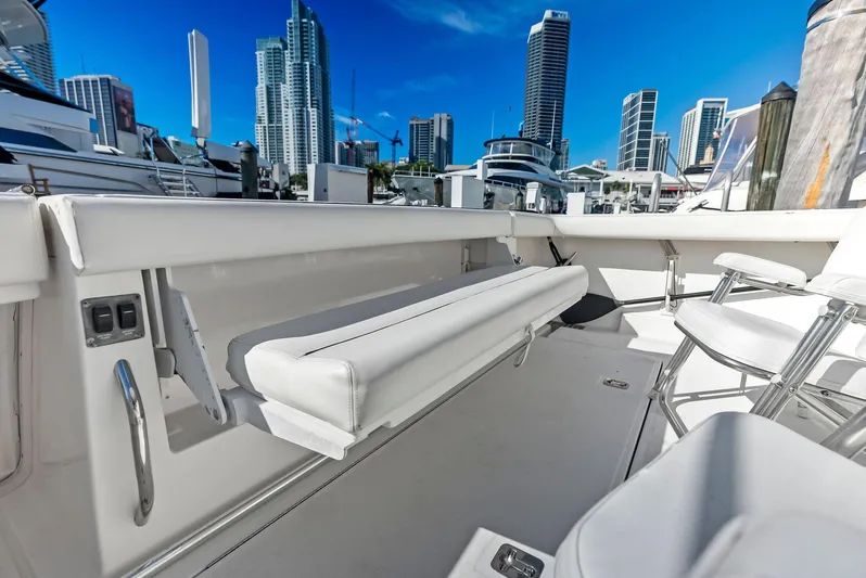 Blue Pearl Yacht Photos Pics Tiara Yachts 4200 Open 2004, sleek deck with city skyline backdrop.