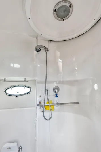 Blue Pearl Yacht Photos Pics 2004 Tiara Yachts 4200 Open bathroom with shower and porthole window.