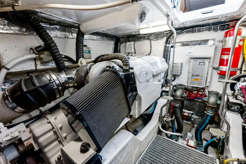 Blue Pearl Yacht Photos Pics Engine room of 2004 Tiara Yachts 4200 Open, showcasing machinery and equipment.