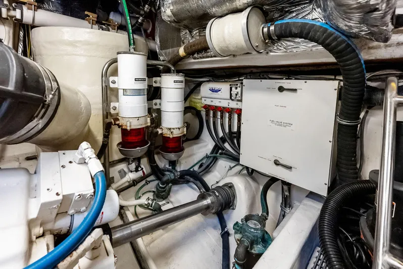 Blue Pearl Yacht Photos Pics Engine room of 2004 Tiara Yachts 4200 Open, showcasing mechanical components and systems.